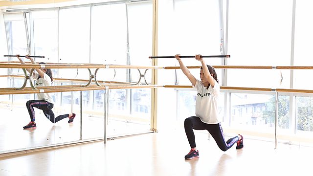 Photo of Lunge back with bodybar lifting exercise