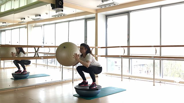 Photo of BOSU Up fitball thruster exercise