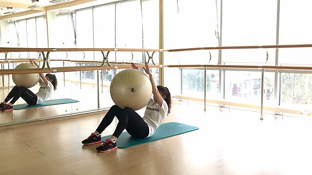 Photo of Crunches with fitball exercise