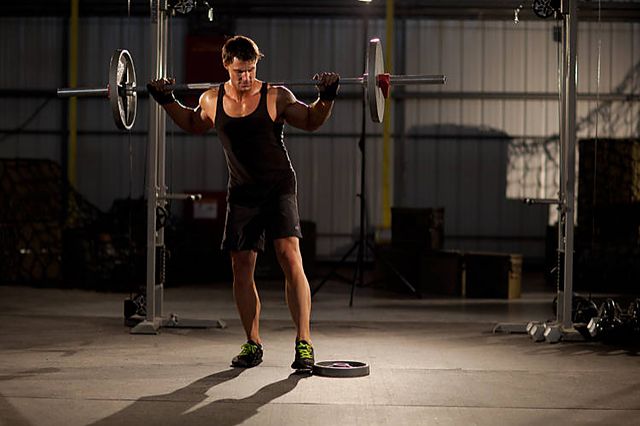 Photo of Squat with Plate Movers exercise