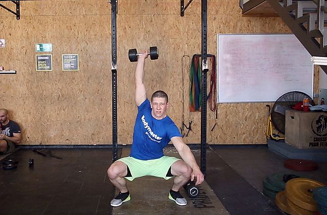 Photo of The Dumbbell Hang Snatch exercise
