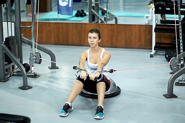 Photo of Bosu Ball Cable Crunch With Side Bends exercise