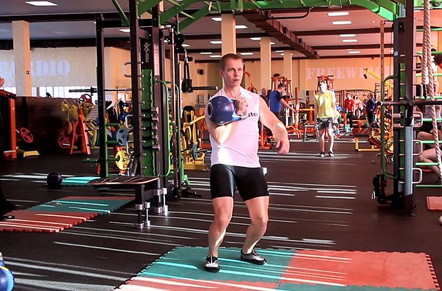 Photo of One-Arm Kettlebell Split Jerk exercise