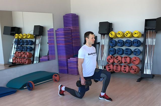 Photo of Dumbbell Rear Lunge exercise