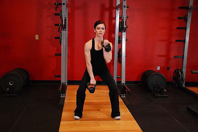 Photo of Double Kettlebell Alternating Hang Clean exercise