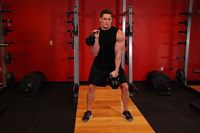 Photo of Double Kettlebell Alternating Hang Clean exercise