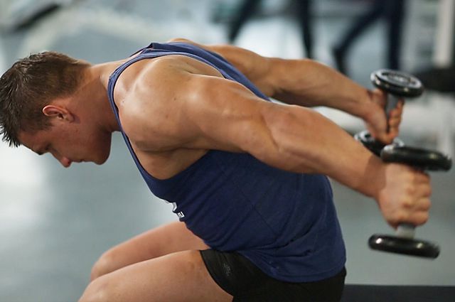 Photo of Seated Bent-Over Two-Arm Dumbbell Triceps Extension exercise