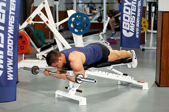 Photo of Lying High Bench Barbell Curl exercise