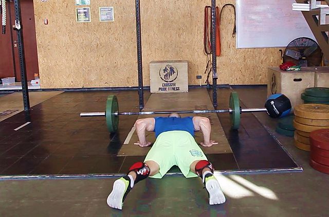 Photo of Burpee Over Barbell exercise