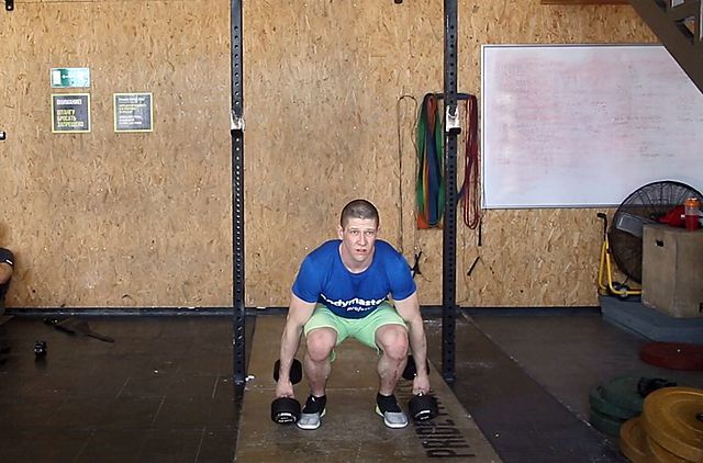 Photo of The Dumbbell Power Clean exercise