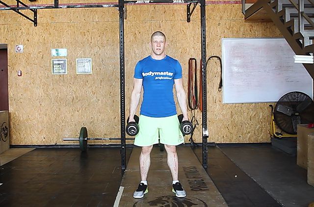 Photo of The Dumbbell Hang Clean exercise