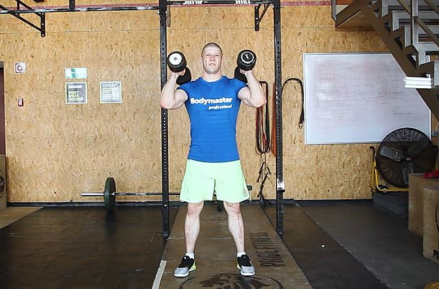 Photo of The Dumbbell Hang Clean exercise