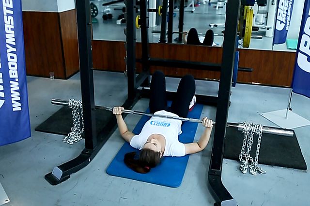 Photo of Floor Press with Chains exercise