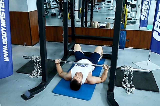 Photo of Floor Press with Chains exercise