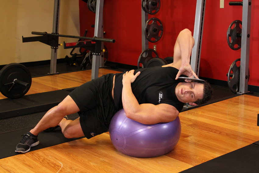 Exercise Weighted Ball Side Bend