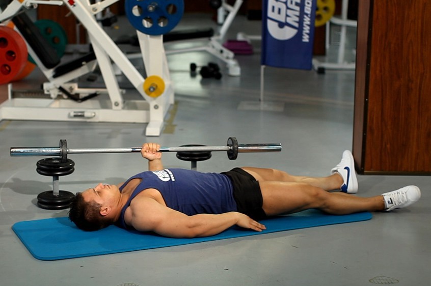 One Arm Floor Press How To Do It Video Of Performing Technique